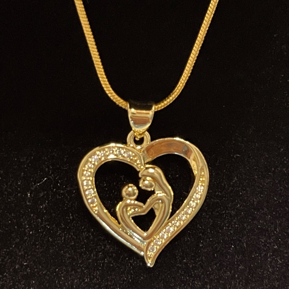 Beautiful Mother and Daughter heart charm gold plated necklace.